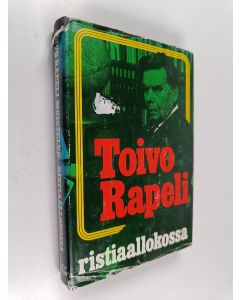 Kirjailijan Toivo Rapeli käytetty kirja Ristiaallokossa