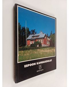 Kirjailijan Veli Nurmi käytetty kirja Espoon kansakoulut 1871-1921