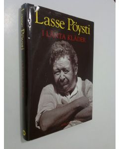 Kirjailijan Lasse Pöysti käytetty kirja I lånta kläder