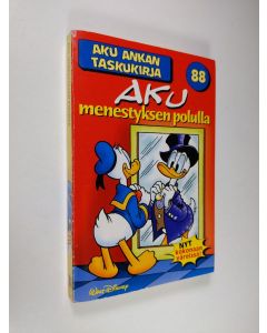 Kirjailijan Walt Disney käytetty kirja Aku menestyksen polulla