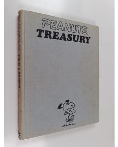 Kirjailijan Charles M. Schulz käytetty kirja Peanuts treasury