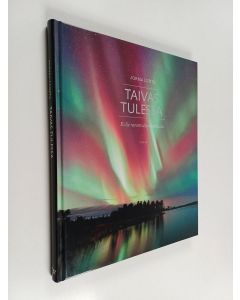 Kirjailijan Jorma Luhta käytetty kirja Taivas tulessa : kulje revontulten loimussa