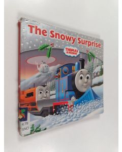 käytetty kirja The snowy surprise
