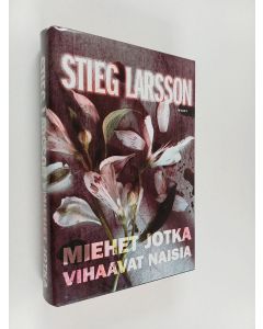Kirjailijan Stieg Larsson käytetty kirja Miehet jotka vihaavat naisia