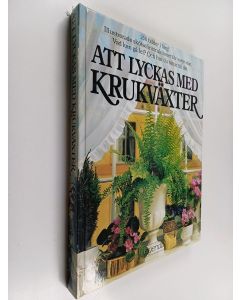Kirjailijan David Longman käytetty kirja Att lyckas med krukväxter