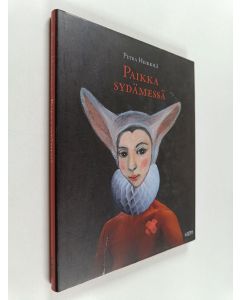 Kirjailijan Petra Heikkilä käytetty kirja Paikka sydämessä : kirja tunteen paloista