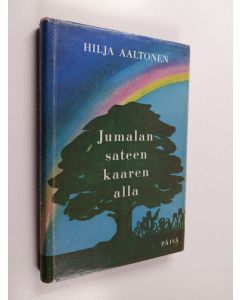 Kirjailijan Hilja Aaltonen käytetty kirja Jumalan sateenkaaren alla