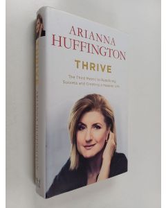 Kirjailijan Arianna Huffington käytetty kirja Thrive : the third metric to redefining success and creating a happier life