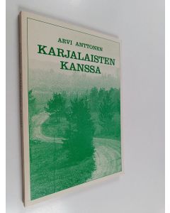 Kirjailijan Arvi Anttonen käytetty kirja Karjalaisten kanssa