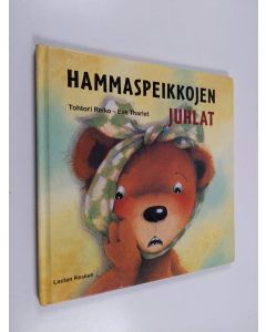 Kirjailijan Tanimura Reiko käytetty kirja Hammaspeikkojen juhlat
