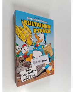 Kirjailijan Walt Disney & Carl Barks käytetty kirja Kultainen kypärä : kaikki Carl Barksin sarjat vuodelta 1952
