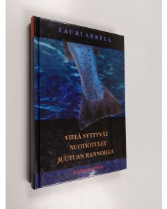 Kirjailijan Lauri Arrela käytetty kirja Vielä syttyvät nuotiotulet Juutuan rannoille