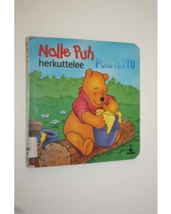 Kirjailijan Patricia Mennen käytetty kirja Nalle Puh herkuttelee