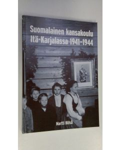 Kirjailijan Martti Hölsä käytetty kirja Suomalainen kansakoulu Itä-Karjalassa 1941-1944 : Itä-Karjalan sotilashallintoesikunnan kansakoululaitos