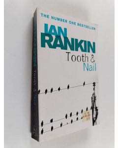 Kirjailijan Ian Rankin käytetty kirja Tooth & Nail
