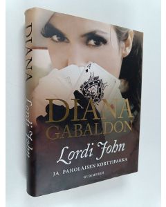 Kirjailijan Diana Gabaldon käytetty kirja Lordi John ja paholaisen korttipakka