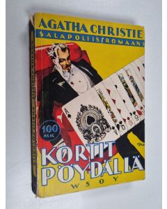 Kirjailijan Agatha Christie käytetty kirja Kortit pöydällä