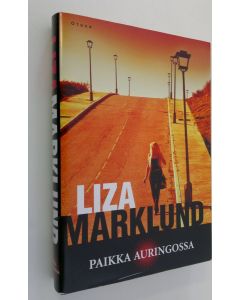 Kirjailijan Liza Marklund käytetty kirja Paikka auringossa