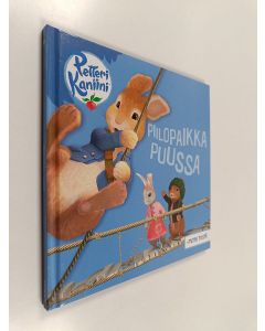 käytetty kirja Piilopaikka puussa