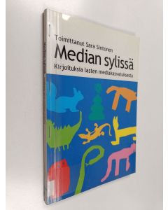 käytetty kirja Median sylissä : Kirjoituksia lasten mediakasvatuksesta