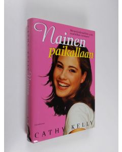 Kirjailijan Cathy Kelly käytetty kirja Nainen paikallaan