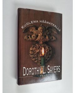 Kirjailijan Dorothy L. Sayers käytetty kirja Kuolema häämatkalla