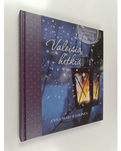 Kirjailijan Anna-Mari Kaskinen käytetty kirja Valoisia hetkiä