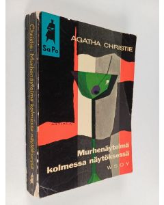 Kirjailijan Agatha Christie käytetty kirja Murhenäytelmä kolmessa näytöksessä