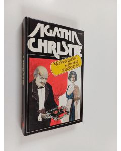 Kirjailijan Agatha Christie käytetty kirja Murhenäytelmä kolmessa näytöksessä
