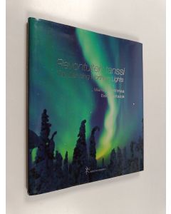 Kirjailijan Esko Valtaoja & Markku Pirttimaa käytetty kirja Revontulten tanssi = The dancing northern lights