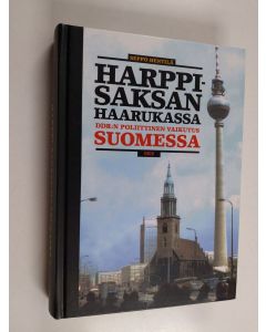 Kirjailijan Seppo Hentilä käytetty kirja Harppi-Saksan haarukassa : DDR:n poliittinen vaikutus Suomessa