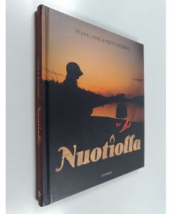 Kirjailijan Pertti Rovamo & Pekka Laine käytetty kirja Nuotiolla