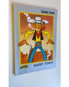 Kirjailijan Edita Morris käytetty kirja Daisy Town : Goscinnyn & Morrisin suuren piirroselokuvan mukaan