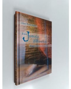 Kirjailijan Olavi Rimpiläinen käytetty kirja Kun Jumala tuli ihmiseksi : piispa Olavin joulukirja