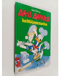 Kirjailijan Walt Disney käytetty kirja Aku Ankka keittiömestarina : Disneyn satulukemisto