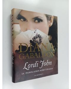 Kirjailijan Diana Gabaldon käytetty kirja Lordi John ja paholaisen korttipakka
