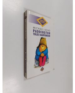 Kirjailijan Michael Bond käytetty kirja Paddington tulee kaupunkiin