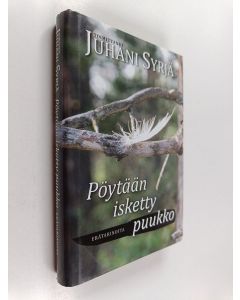 Tekijän Juhani Syrjä  käytetty kirja Pöytään isketty puukko : erätarinoita