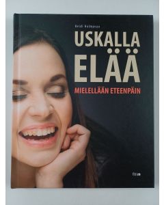 Kirjailijan Heidi Holmavuo uusi kirja Uskalla elää : mielellään eteenpäin (UUSI)