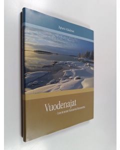 Kirjailijan Tapani Räsänen käytetty kirja Vuodenajat : luontomme katoavaa kauneutta