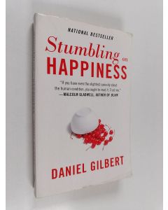 Kirjailijan Daniel Gilbert käytetty kirja Stumbling on Happiness