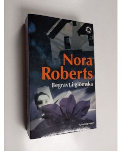 Kirjailijan Nora Roberts käytetty kirja Begravt i glömska