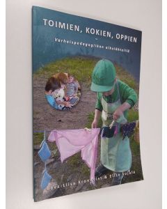 Kirjailijan Eeva-Liisa Kronqvist käytetty kirja Toimien, kokien, oppien : varhaispedagogiikan alkulähteillä