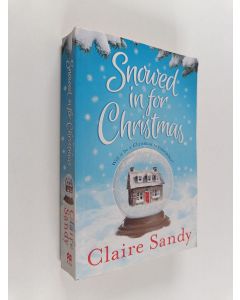 Kirjailijan Claire Sandy käytetty kirja Snowed in for Christmas