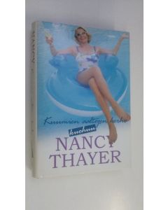 Kirjailijan Nancy Thayer käytetty kirja Kuumien aaltojen kerho kuohuu