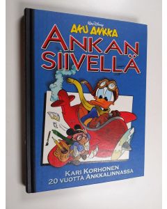 Kirjailijan Kari Korhonen käytetty kirja Ankan siivellä : 20 vuotta Ankkalinnassa