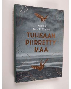 Kirjailijan Petra Rautiainen käytetty kirja Tuhkaan piirretty maa