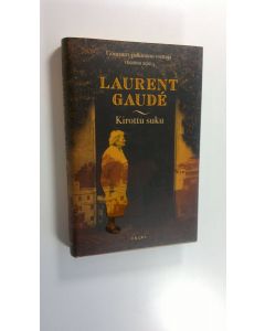 Kirjailijan Laurent Gaude käytetty kirja Kirottu suku