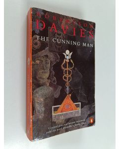 Kirjailijan Robertson Davies käytetty kirja The cunning man