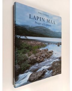 Kirjailijan Pekka Luukkola käytetty kirja Lapin maa = Images of Lapland